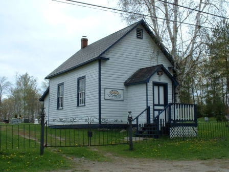 view of schoolhouse building from outside